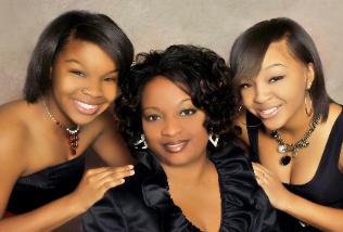 Pastor C and daughters, Gabrielle and Garilyn